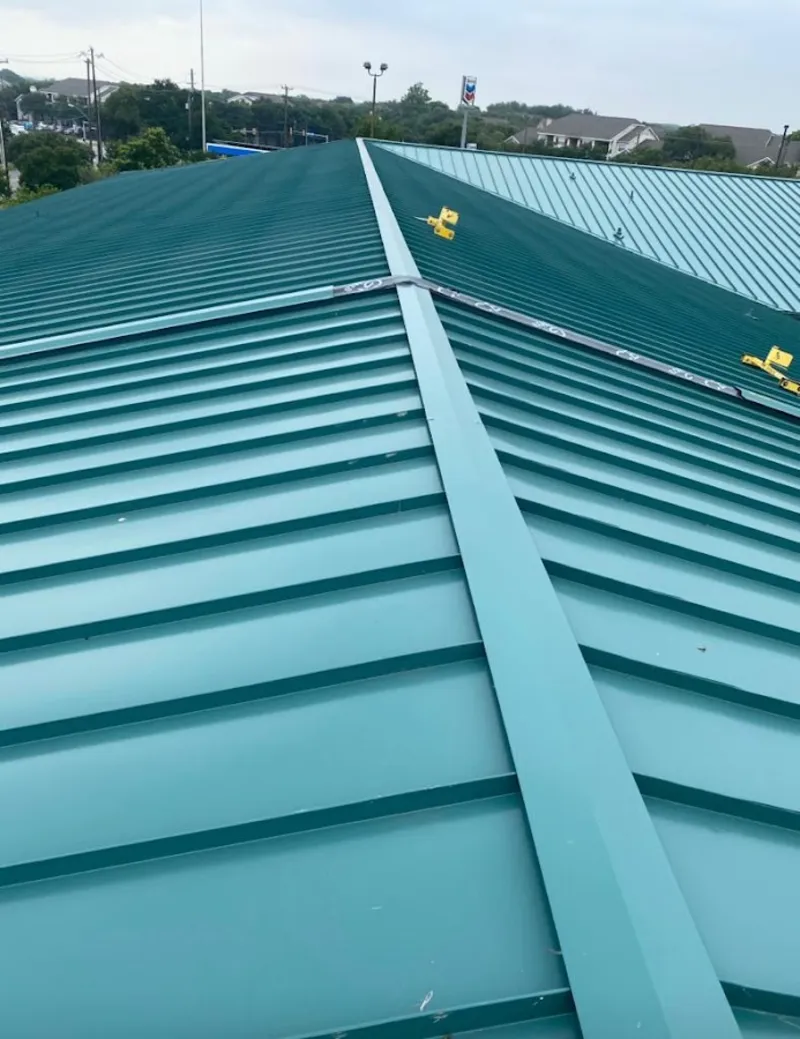 Green commercial metal roof ridge and valley for Metal Roof Repair in Panama City